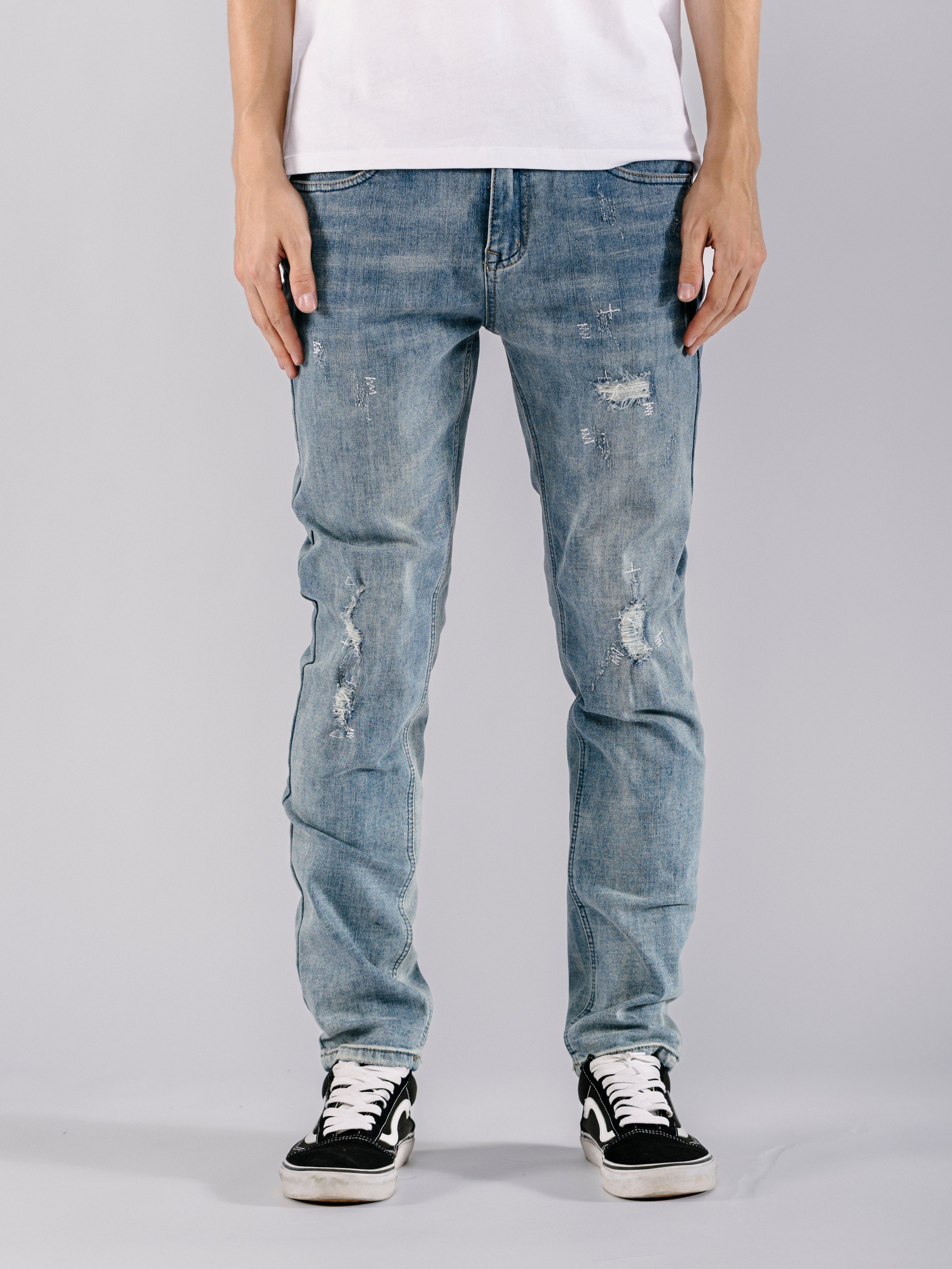 Ripped Tapered Jeans