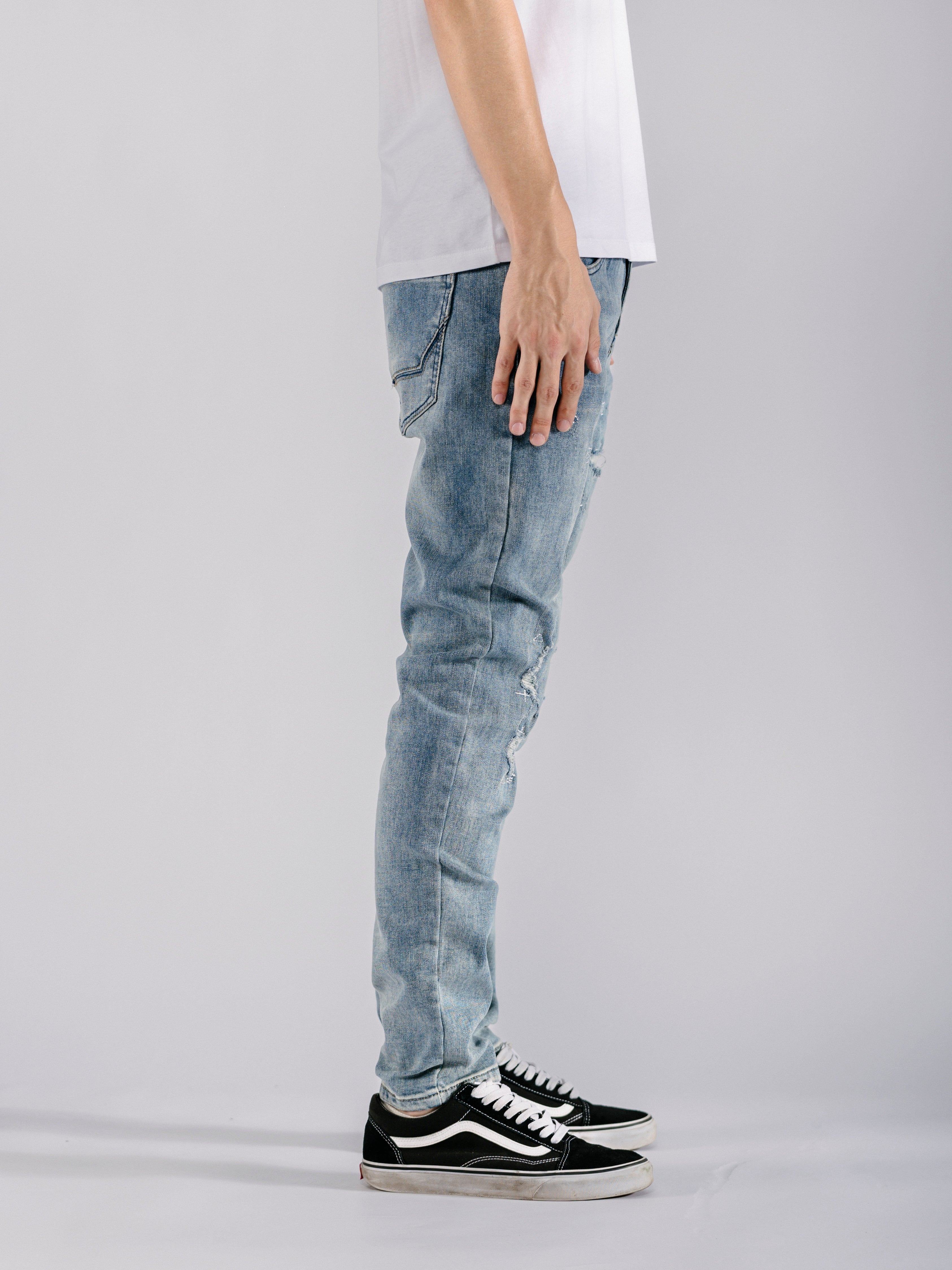 Ripped Tapered Jeans