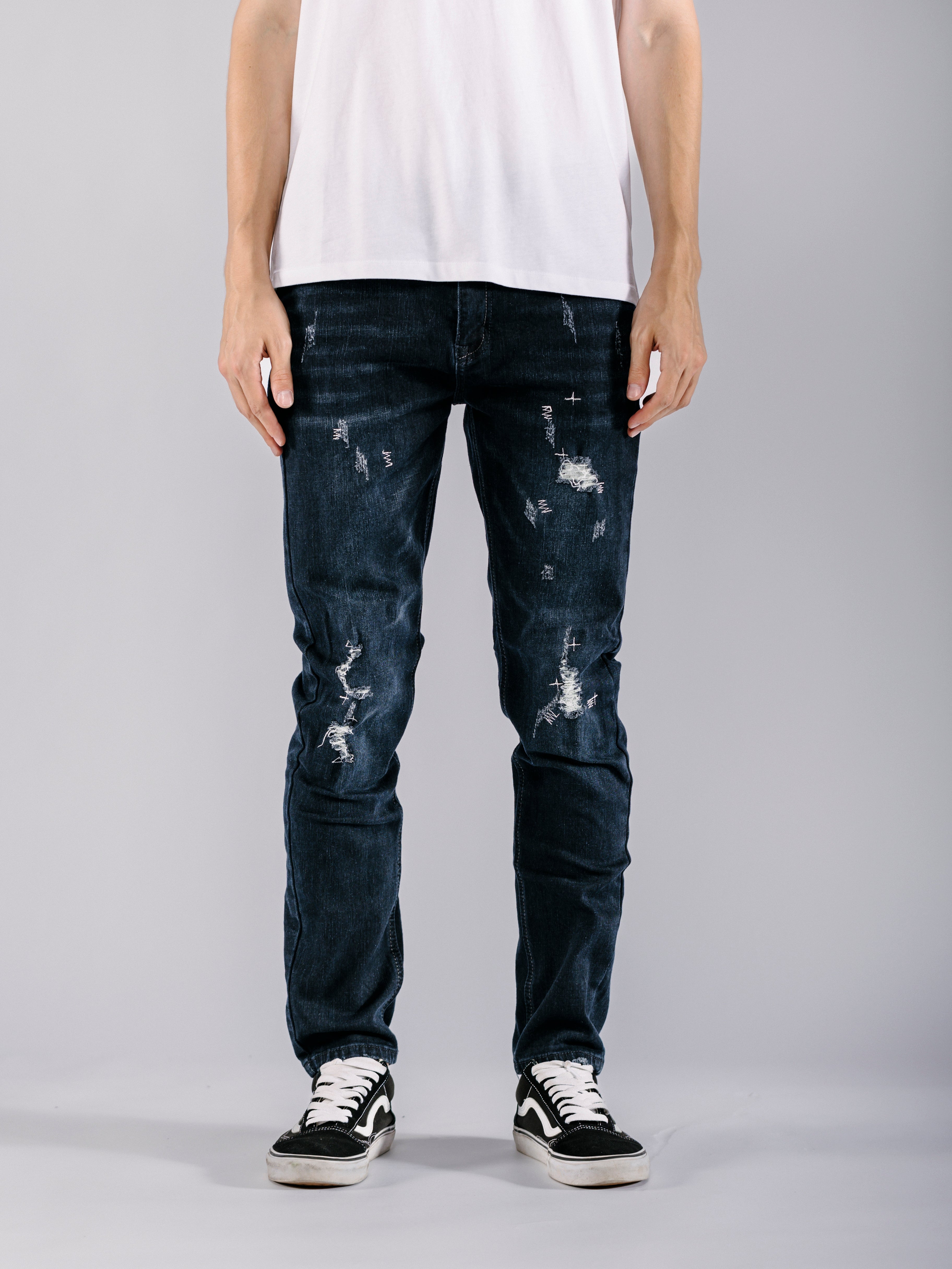 Ripped Tapered Jeans