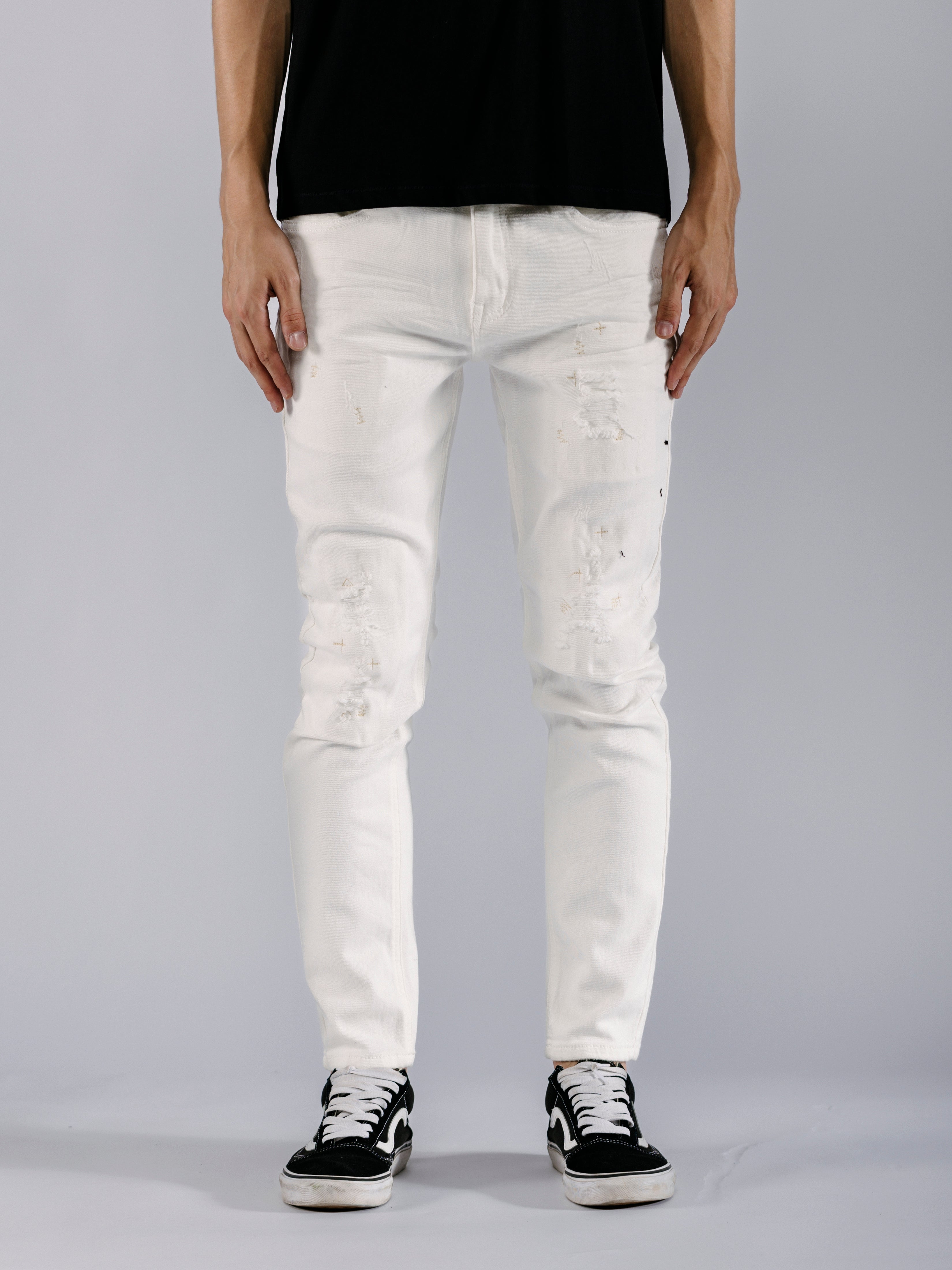 Ripped Tapered Jeans